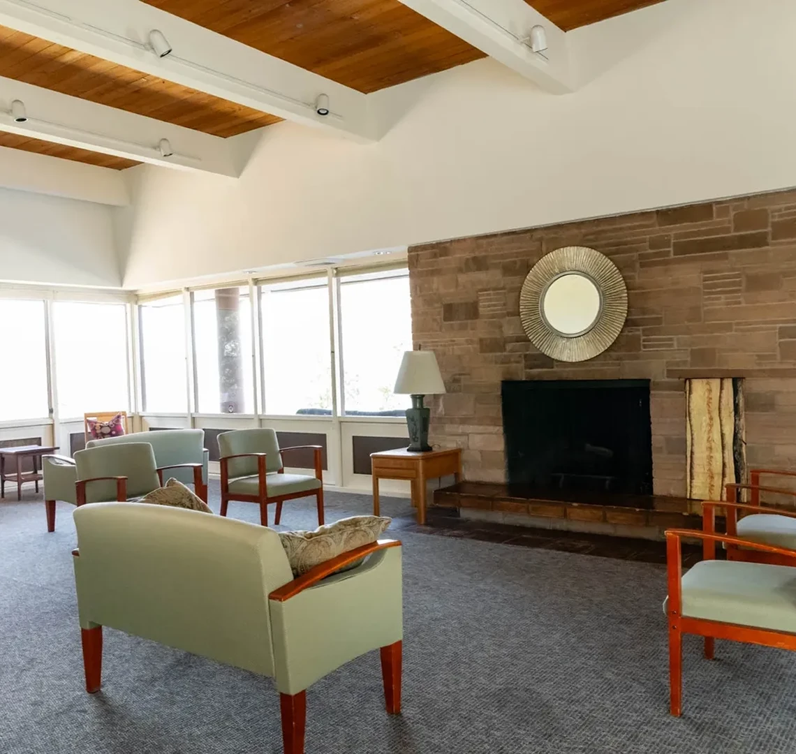 Mid-century modern living room with fireplace.