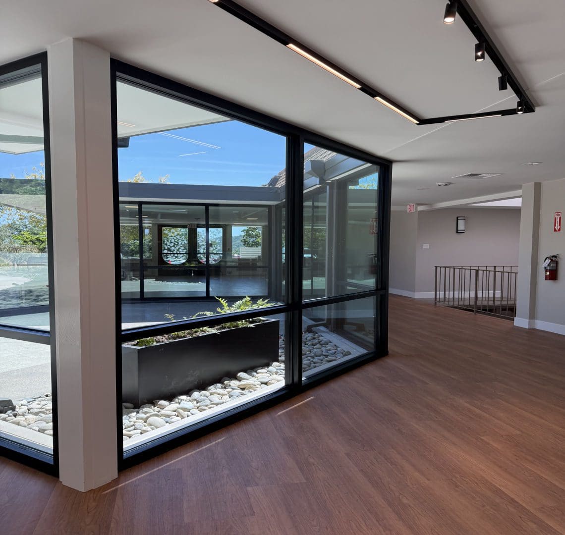 Modern interior with large glass windows.